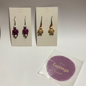 Purple and white turtle earrings ( dangling )